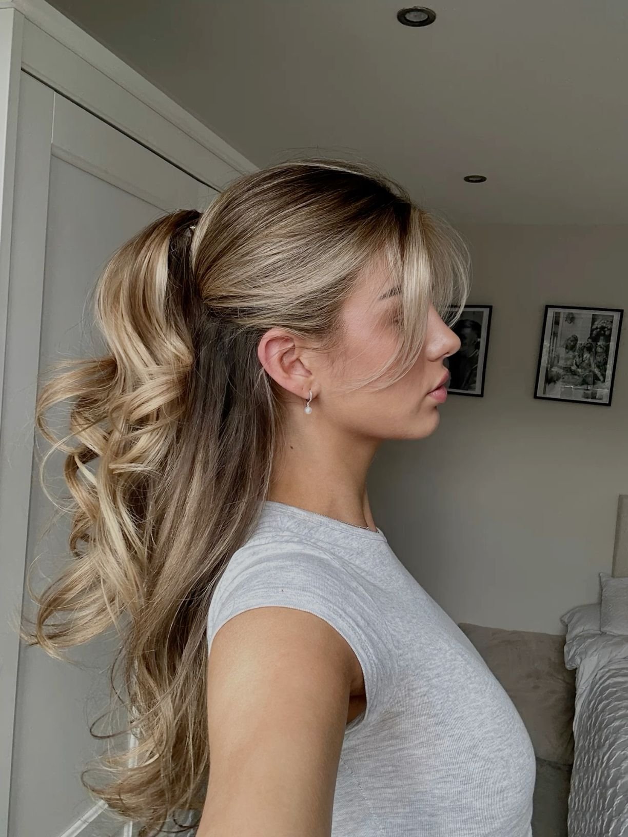 Half up hairstyle with face framing pieces
