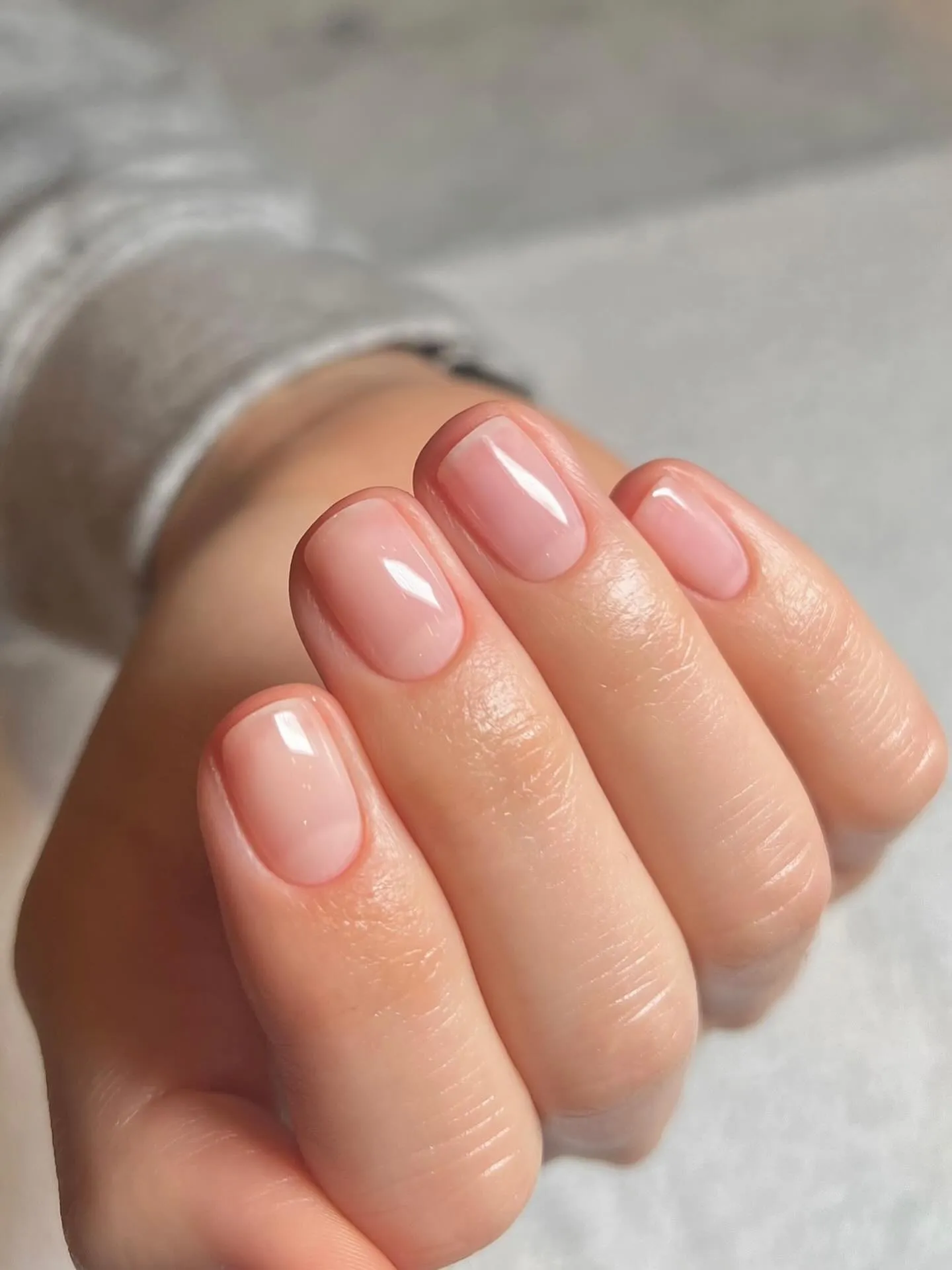 Natural nails with clear gloss only for a healthy manicure