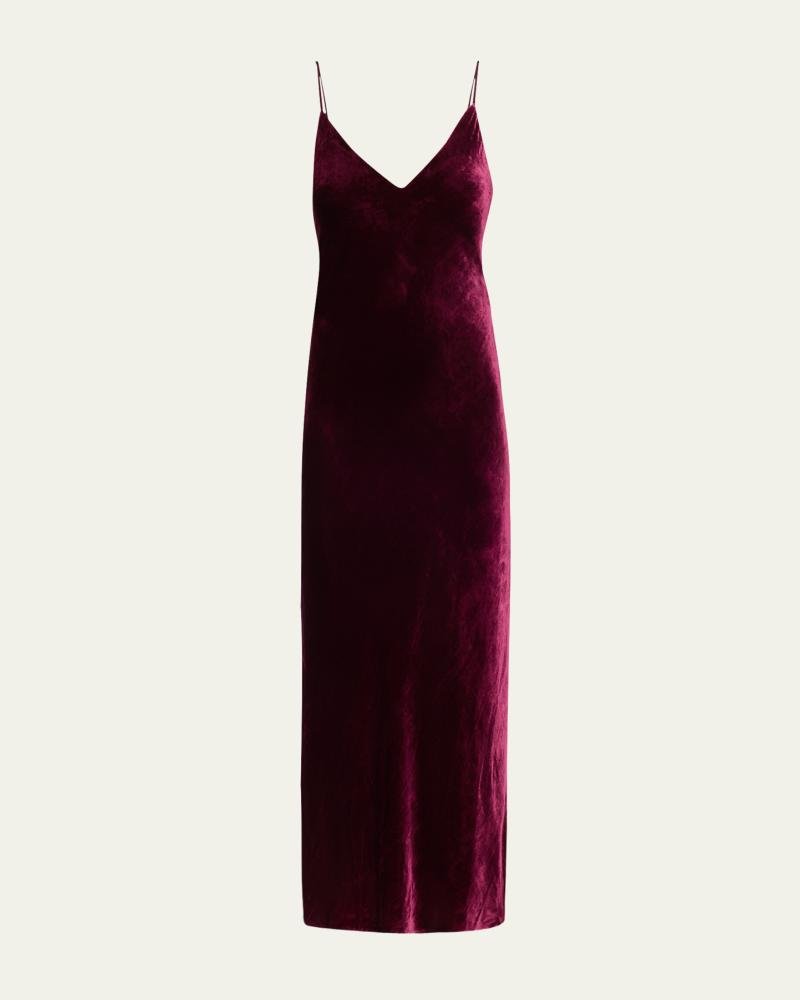 Woman in a burgundy velvet slip dress dark romantic