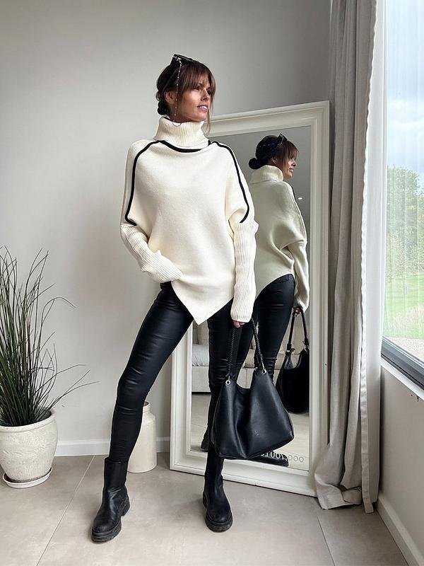 Oversized turtleneck sweater with leather leggings fall