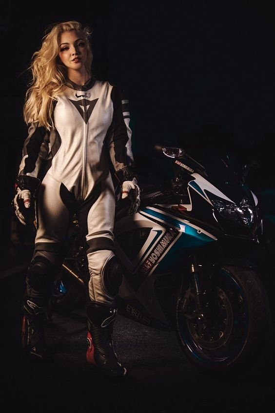 Woman in MotoGP motorcycle racer leather suit costume