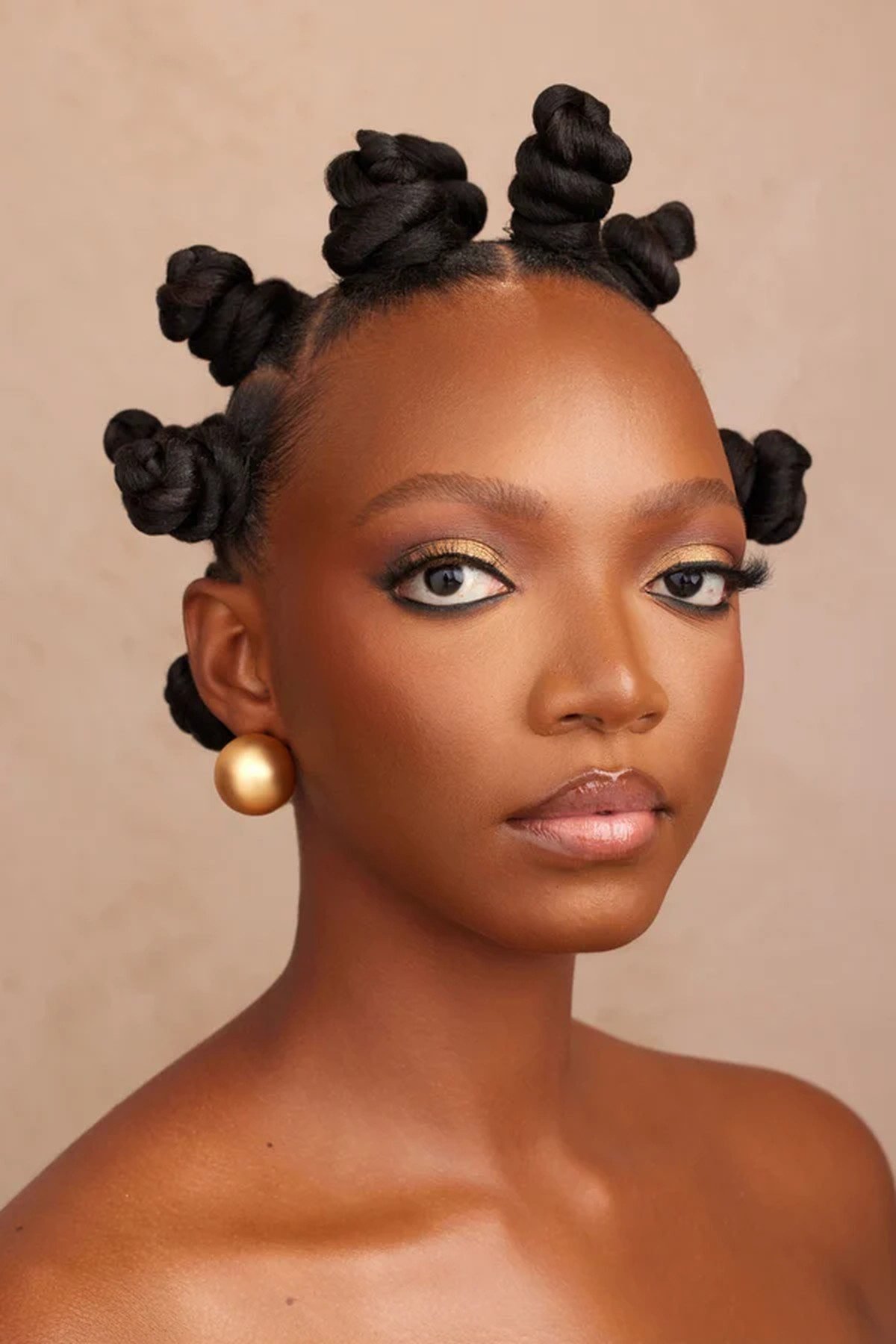 Black woman with bantu knots hairstyle