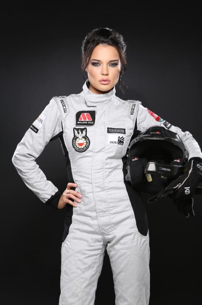 Woman in rally driver racing suit costume