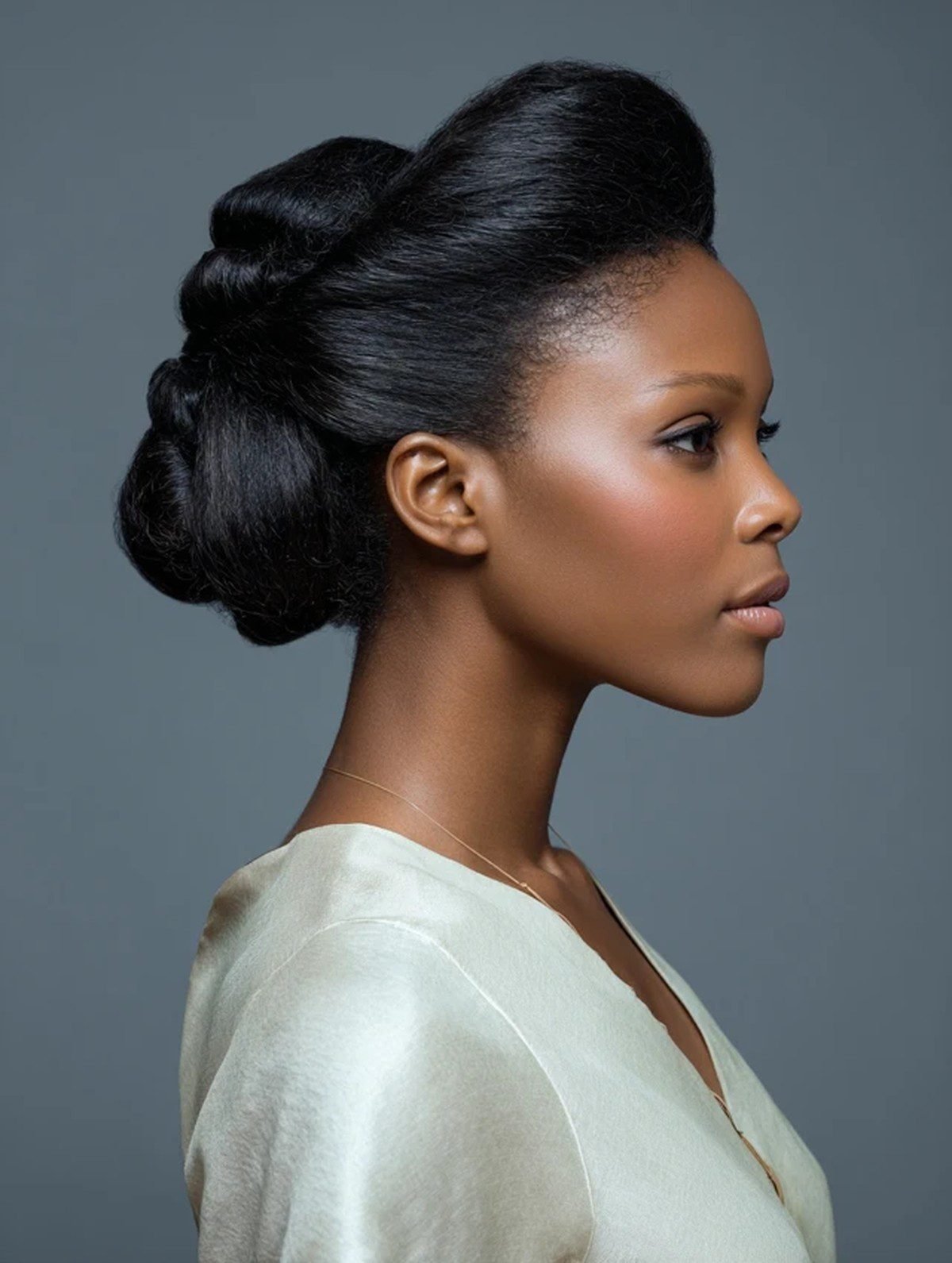 Black woman with an elegant chignon updo