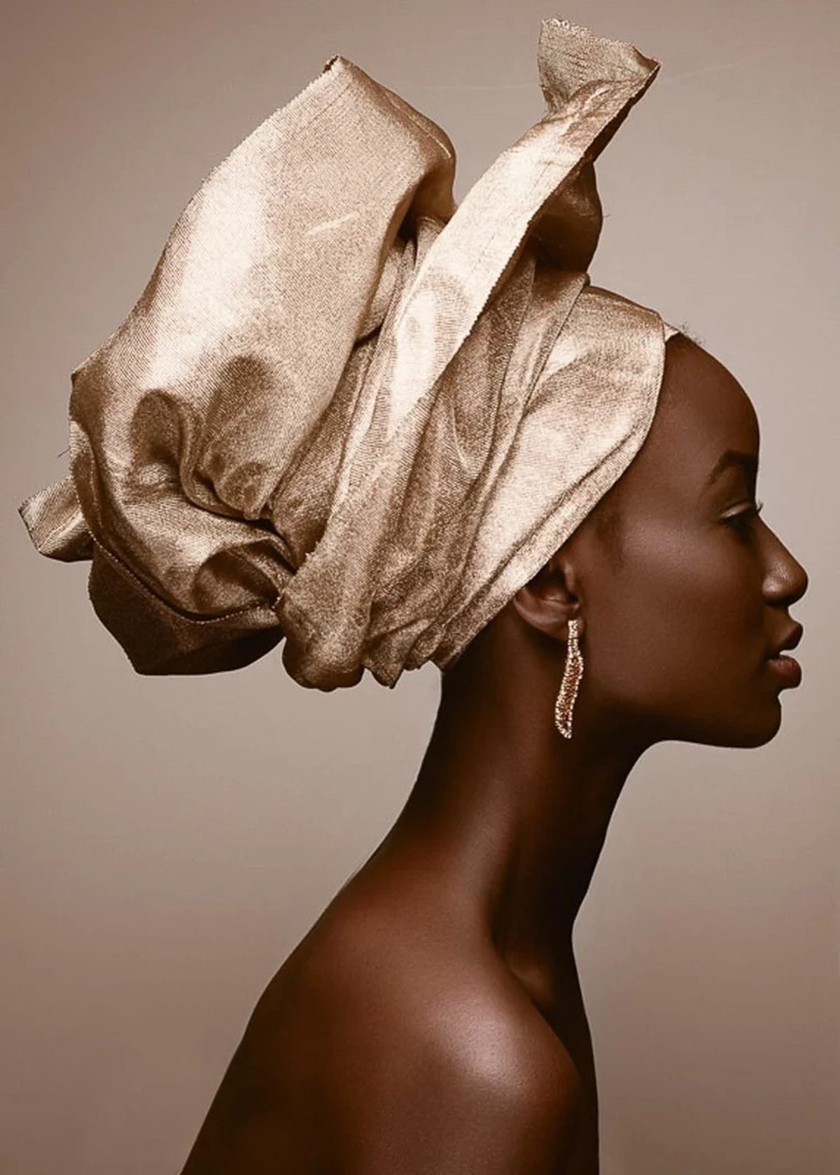 Black woman with an elegant headwrap style