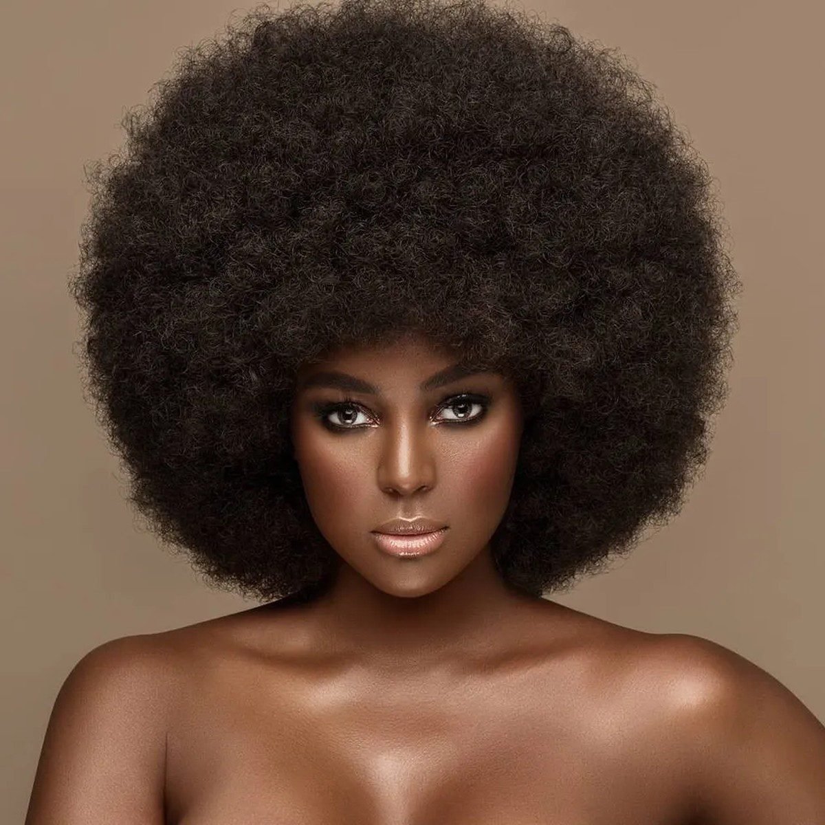 Black woman with a voluminous afro hairstyle