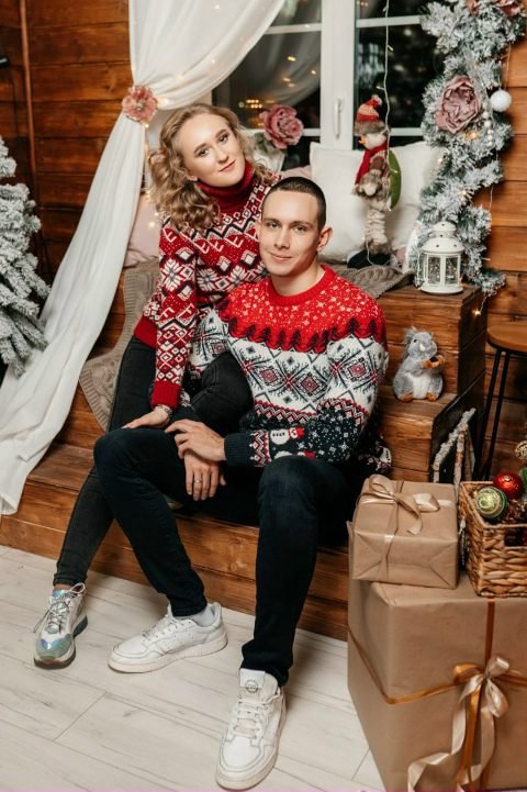 Couple matching sweaters christmas photos