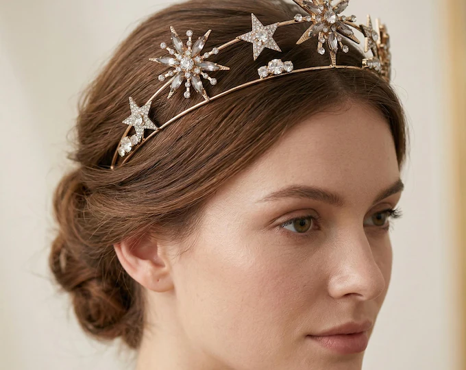Woman wearing a white bridal dress with a celestial star tiara