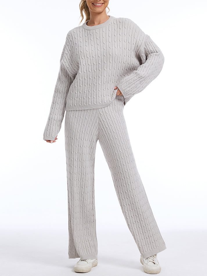 Woman wearing cable-knit sweater with wide-leg lounge pants