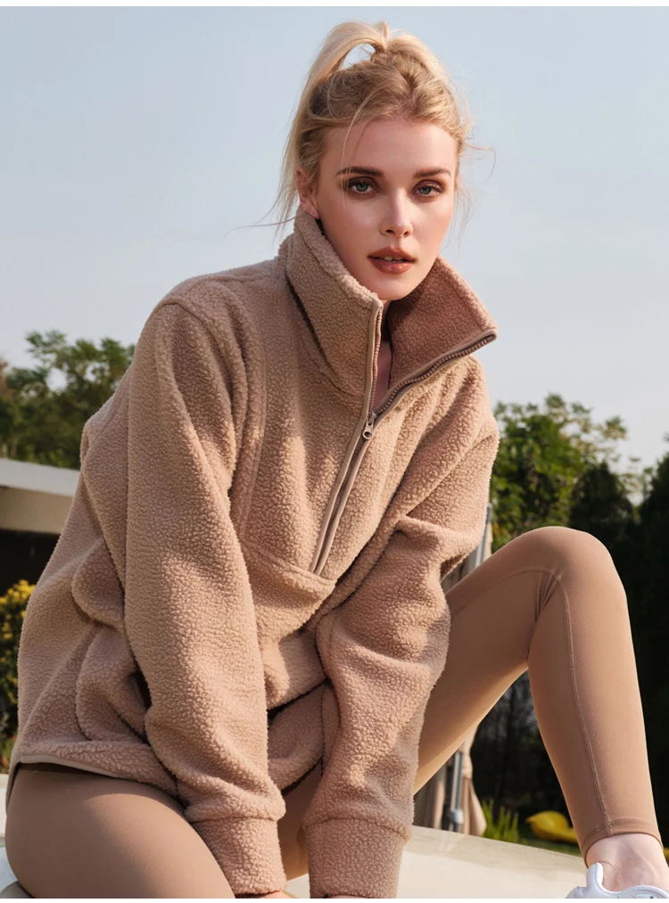Woman in sherpa pullover with leggings for fall loungewear