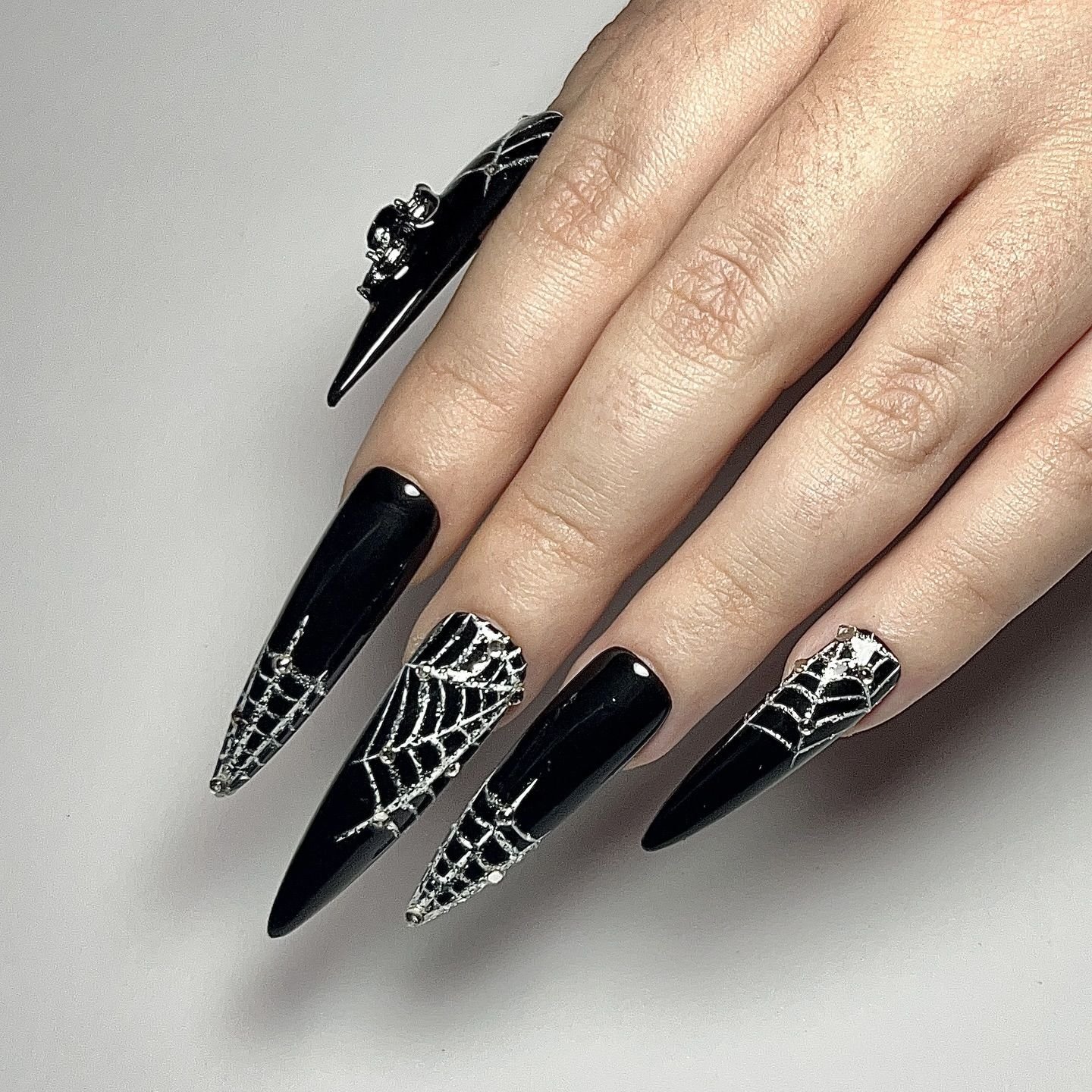 13. Webs With Rhinestone Spider