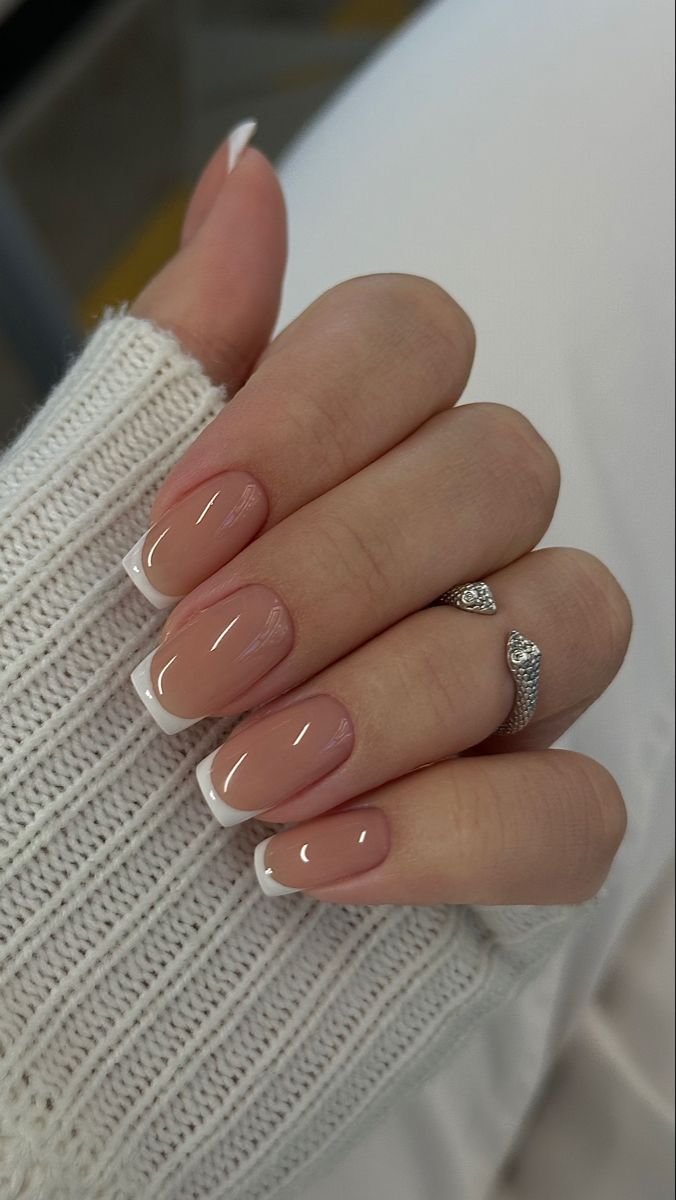Classic French manicure with nude and taupe for mature women