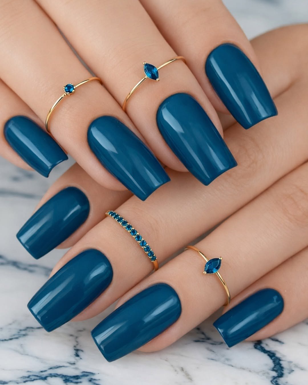 Deep teal jewel tone nails for mature women
