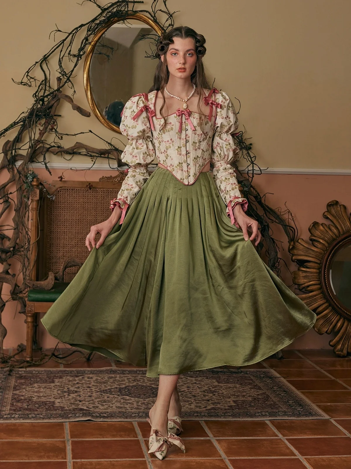 Woman in corset top with flowing midi skirt