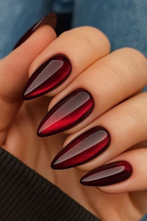 Glossy blood-red stiletto nails
