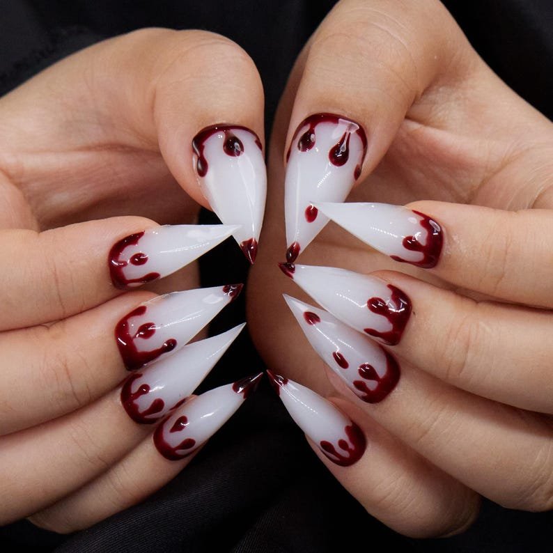 Stiletto French tip nails with dripping blood effect