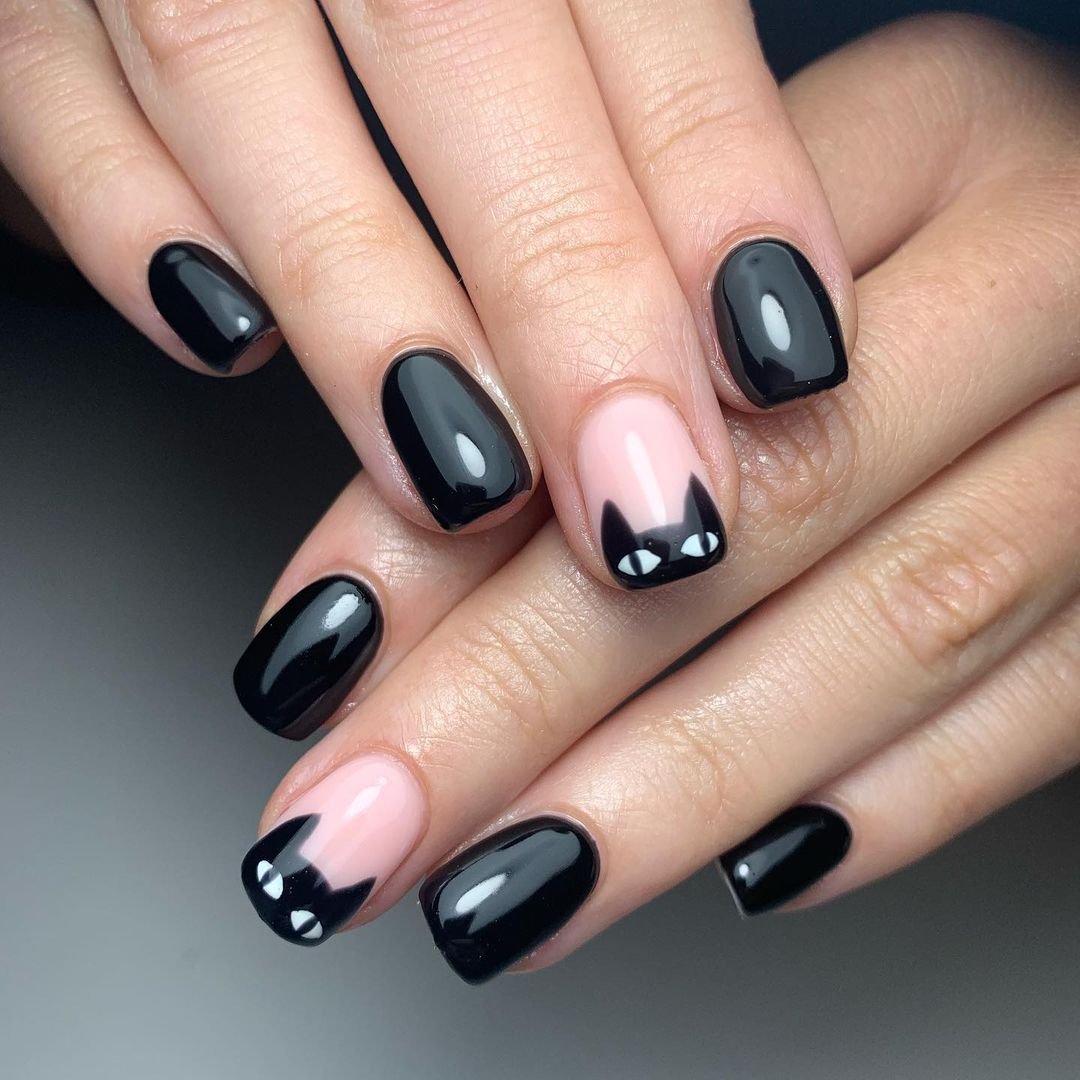 Black cat paw print trail Halloween nails