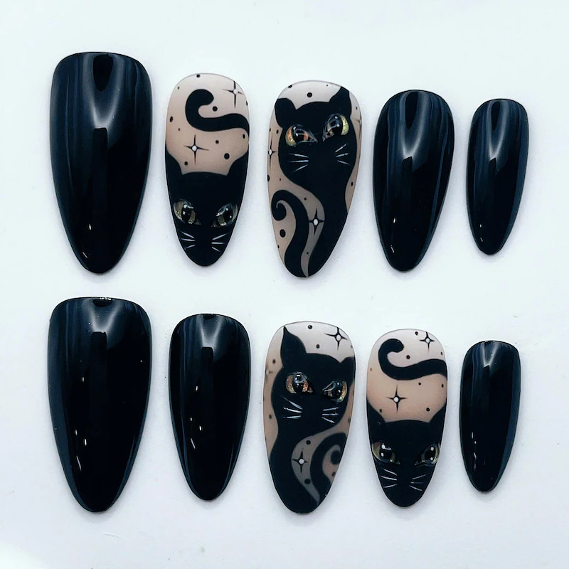 Black and white cat duo Halloween nail designs