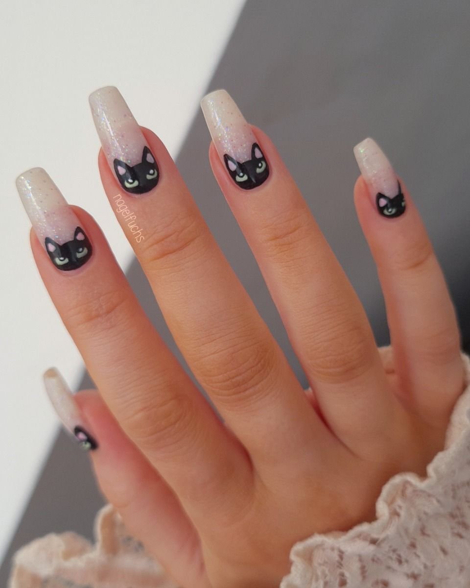 Stained glass black cat Halloween nail art