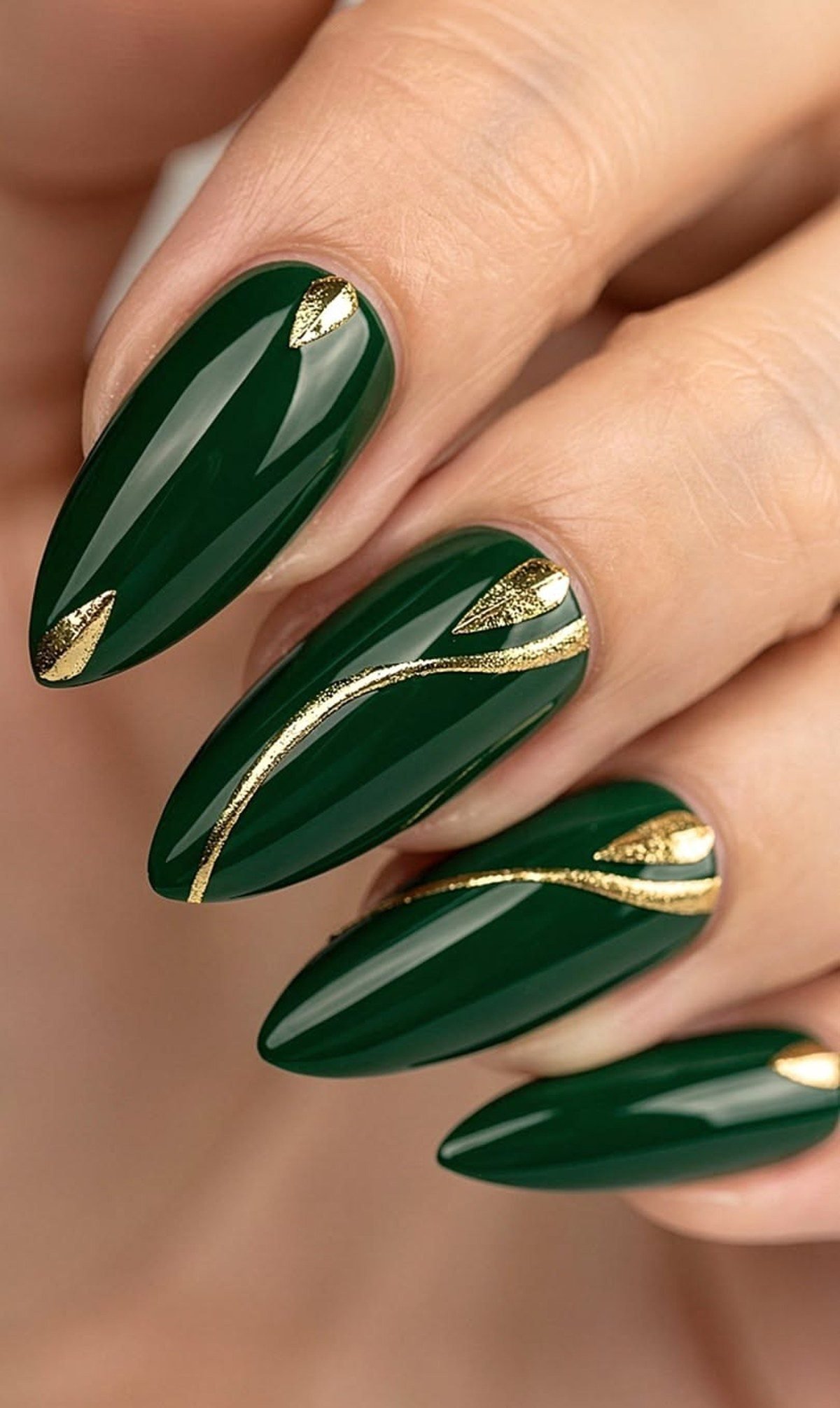 Emerald green homecoming nails with gold foil accents for a long dress