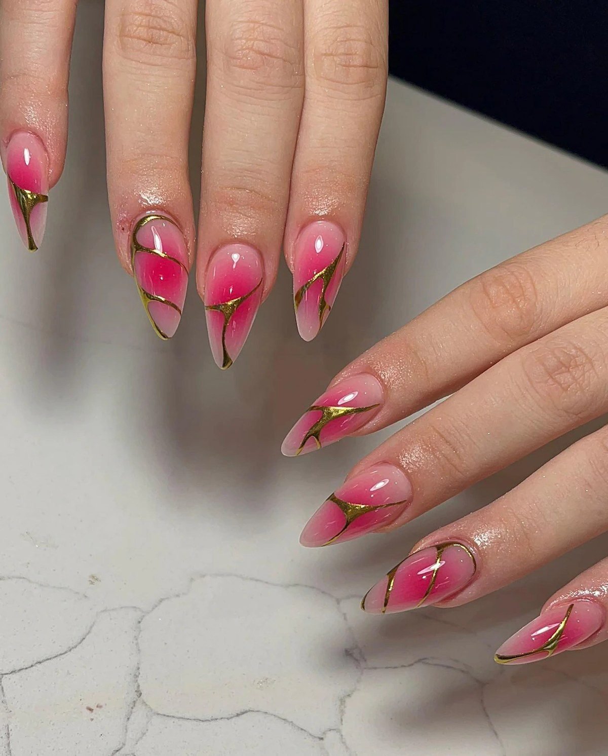 Pink aura chrome homecoming nails for a short dress