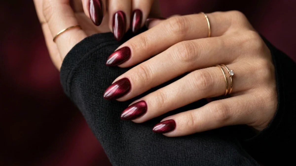 Burgundy velvet cat-eye homecoming nails for a long fall dress