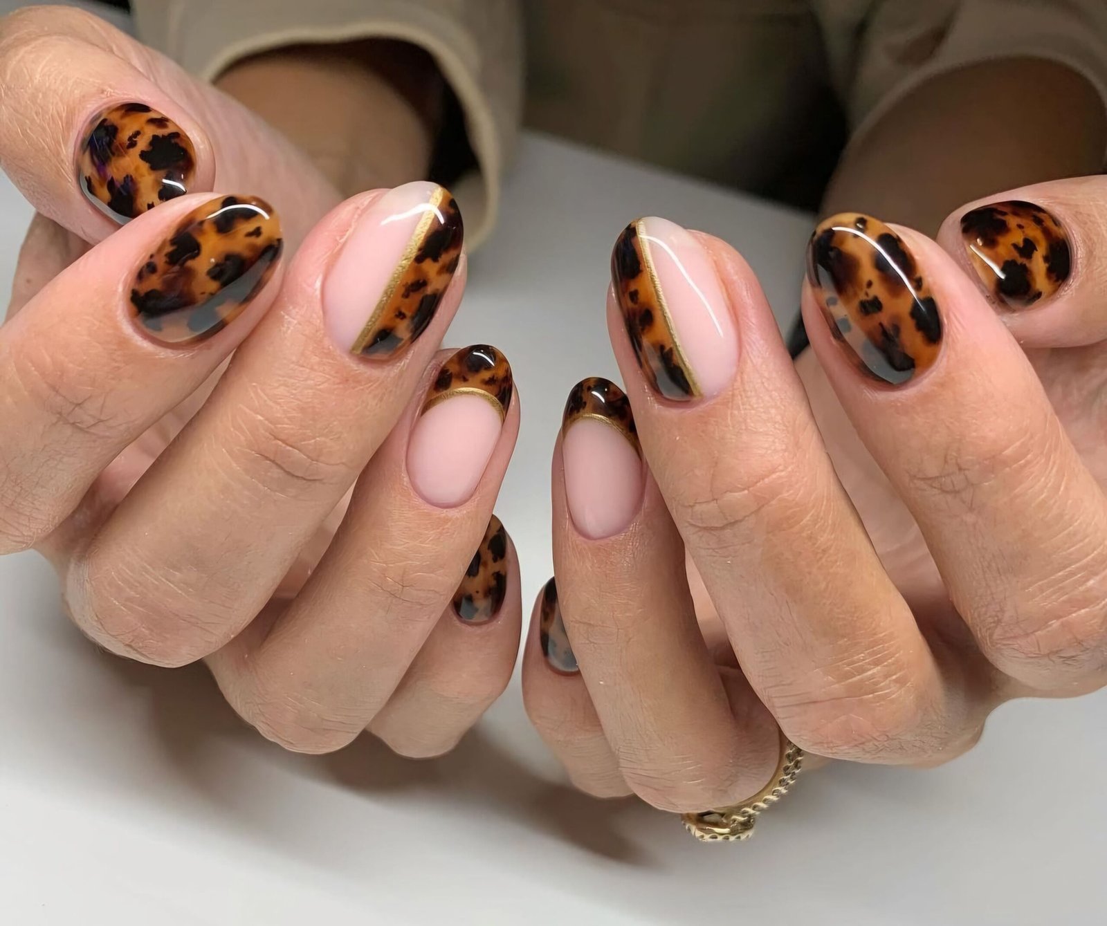 Tortoiseshell nail art on short nails