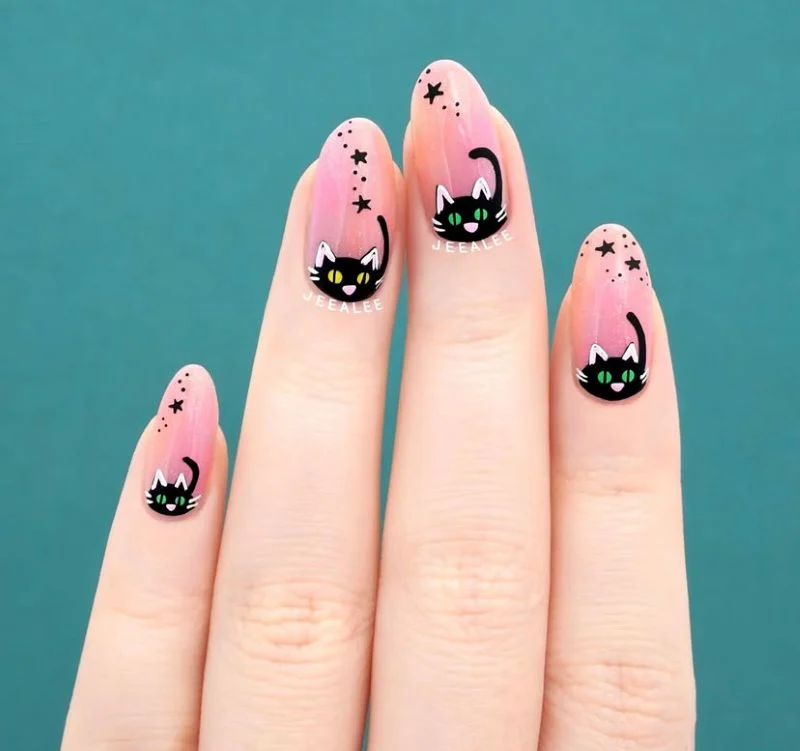 Midnight French with star dots Halloween nails