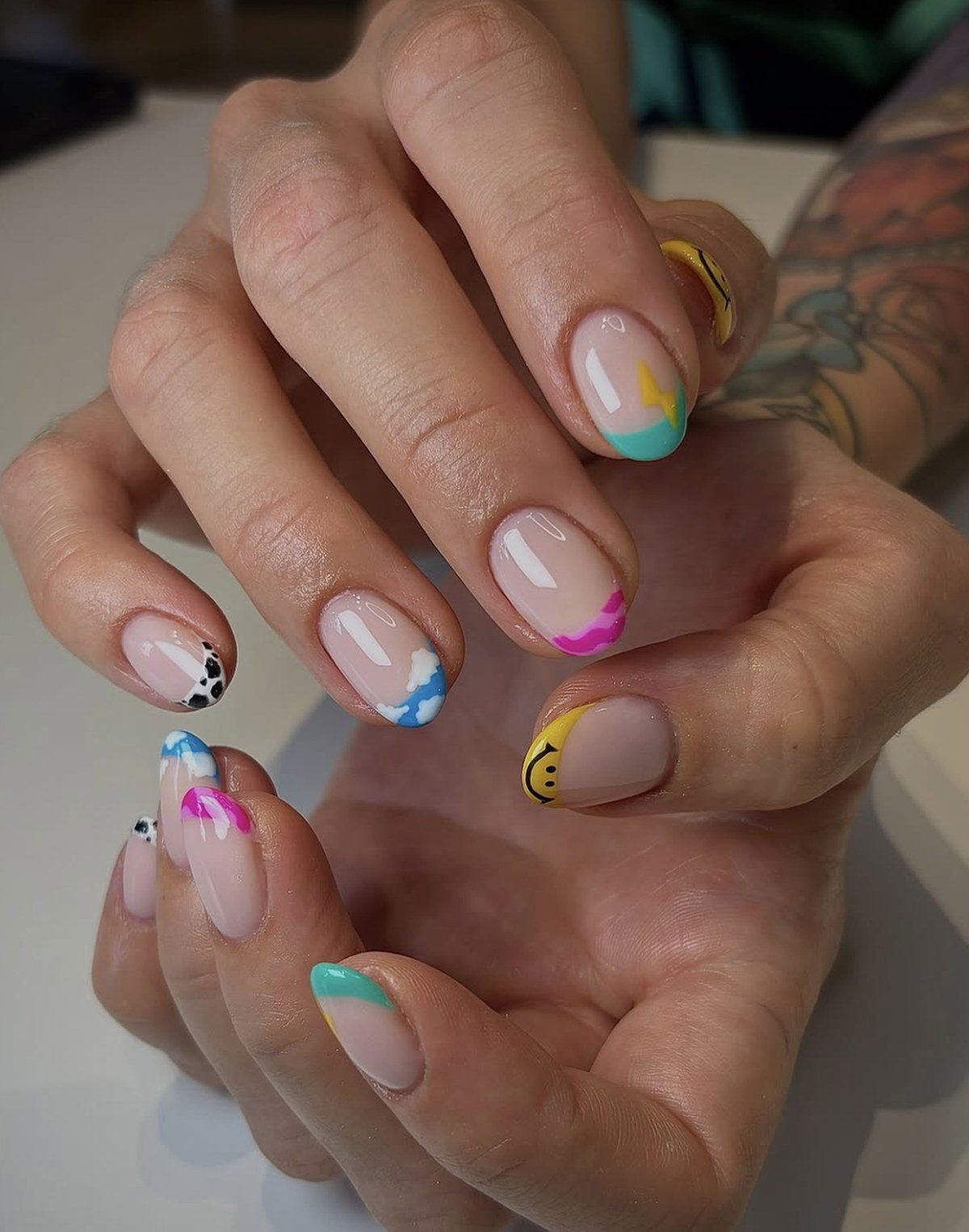 Mismatched colorful french tip homecoming nails