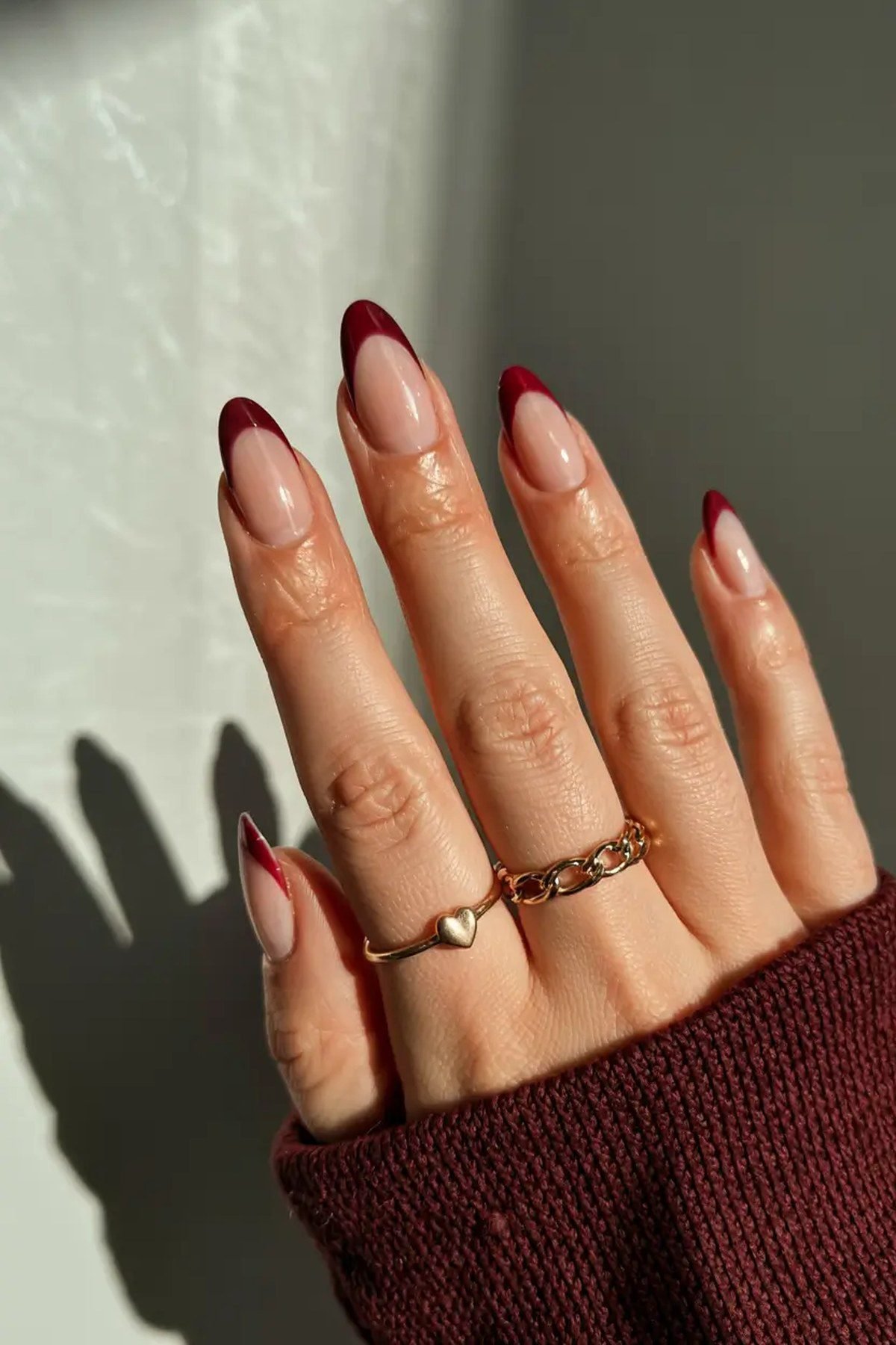 Burgundy french tip homecoming nails for fall