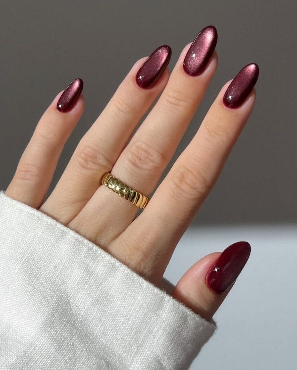 Burgundy velvet cat-eye nails with gold for hoco
