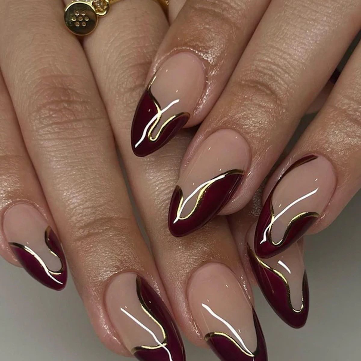 Burgundy french tips with gold outline for hoco