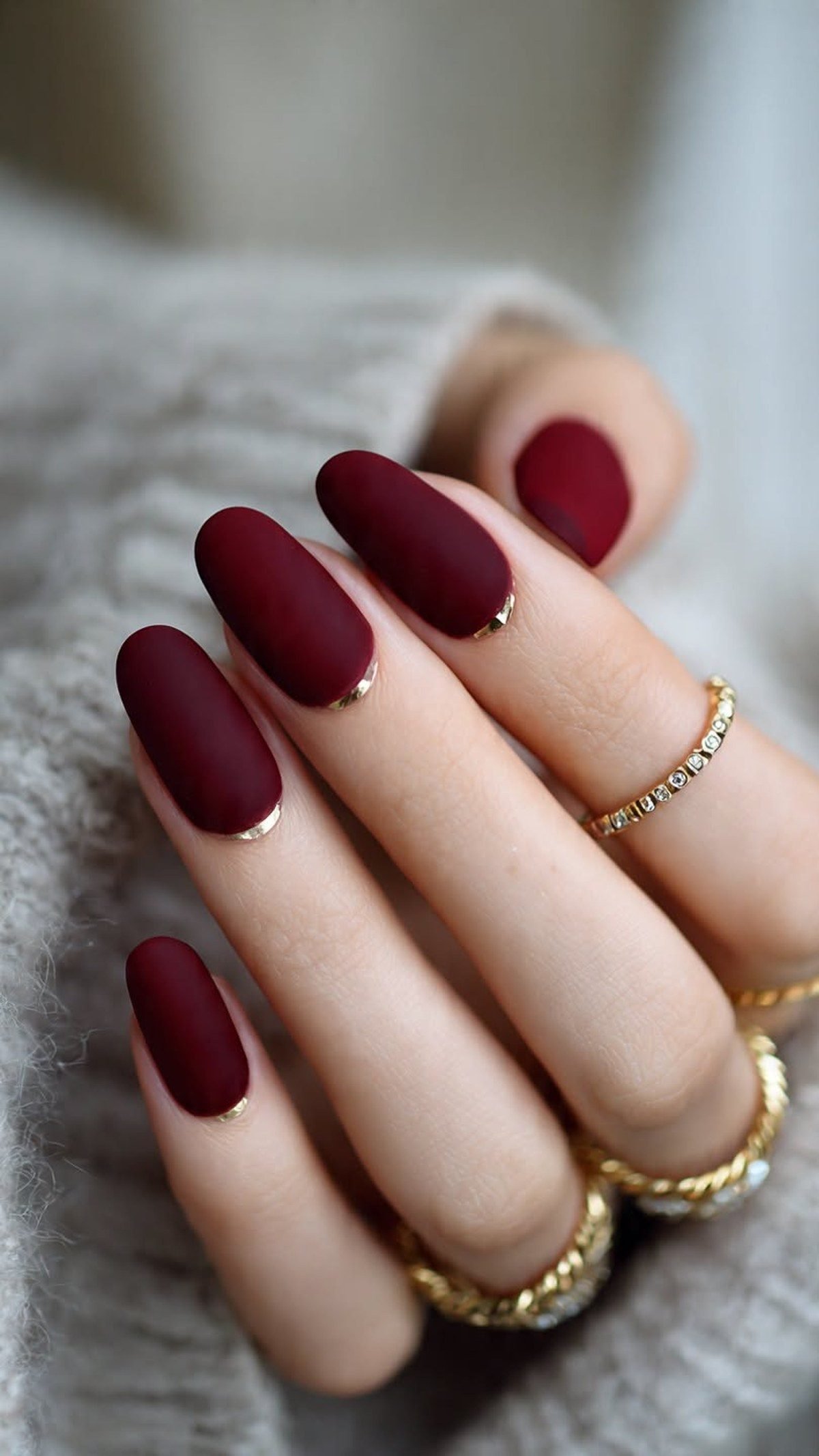 Matte burgundy nails with glossy gold tips for hoco