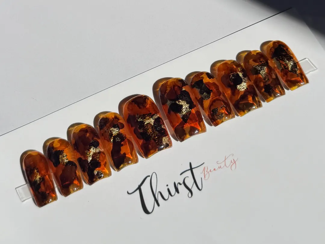 Tortoise shell nails with autumn leaf accents