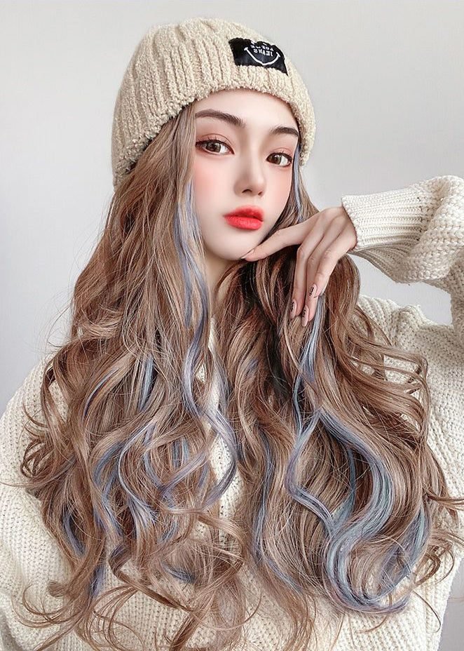 Loose waves styled to survive a beanie