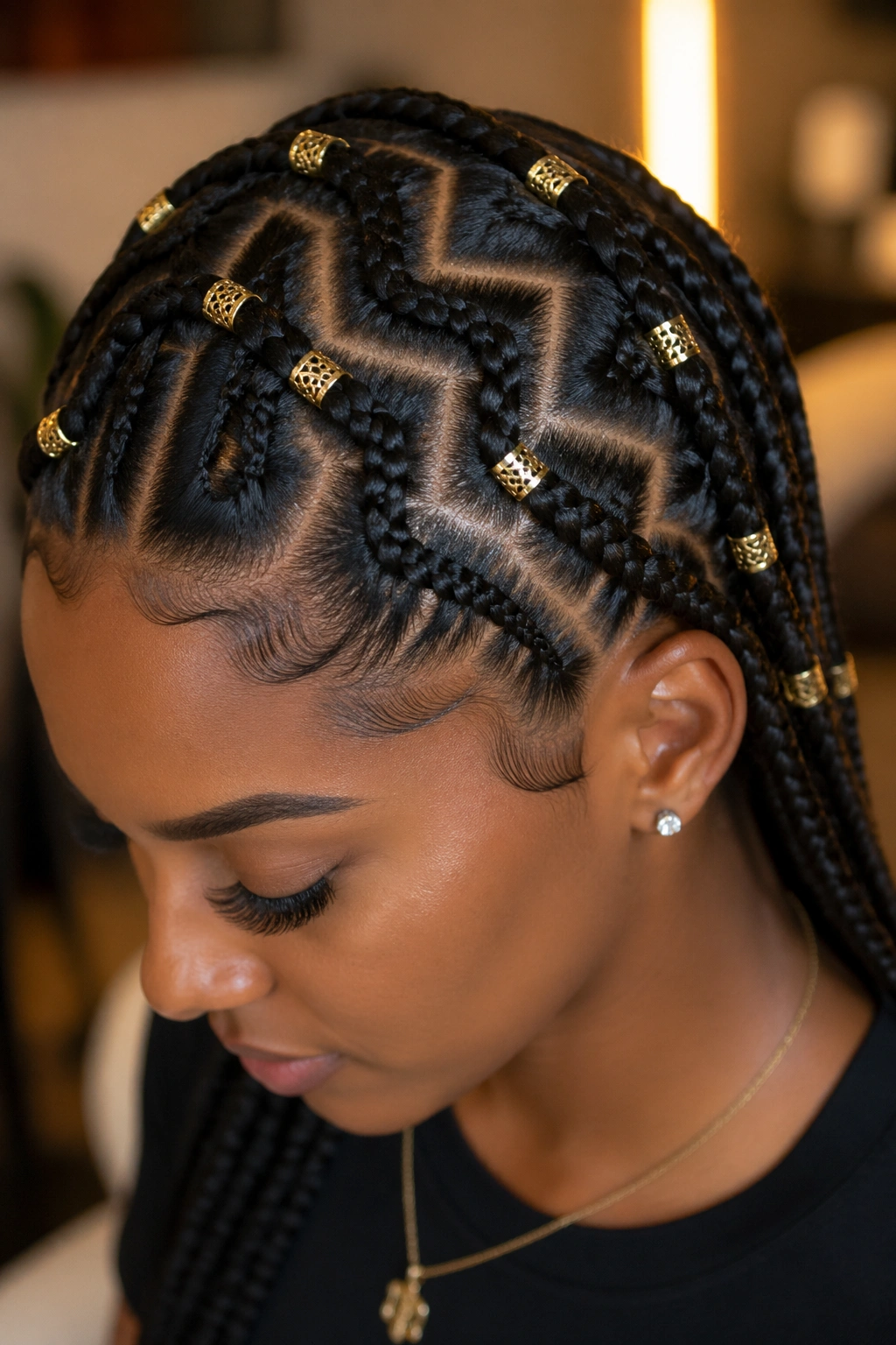 Cornrows with gold hair cuffs