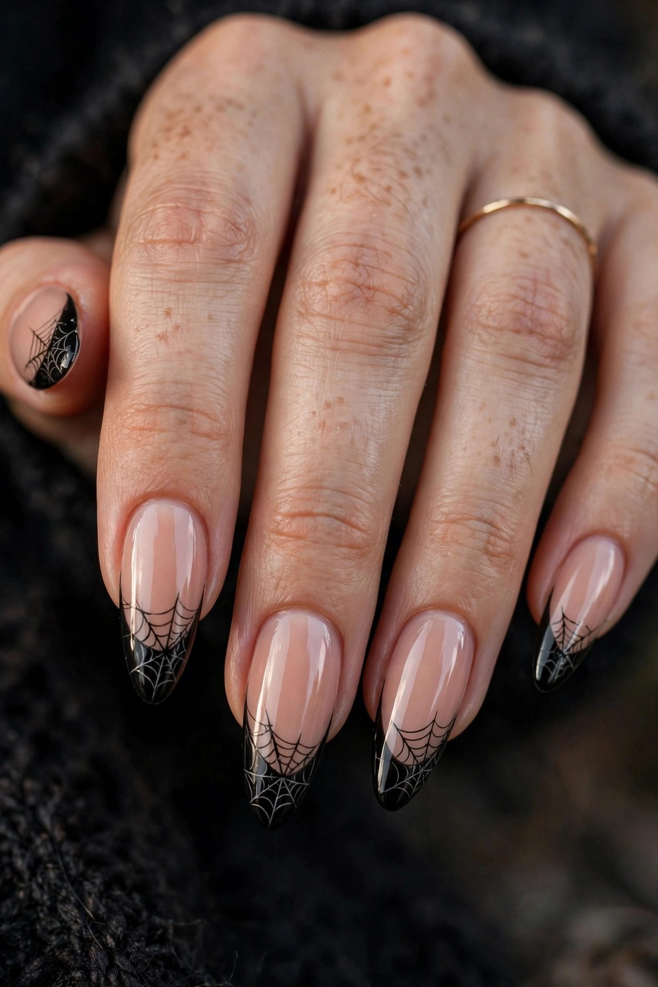 Long nails with black spiderweb french tip nail design