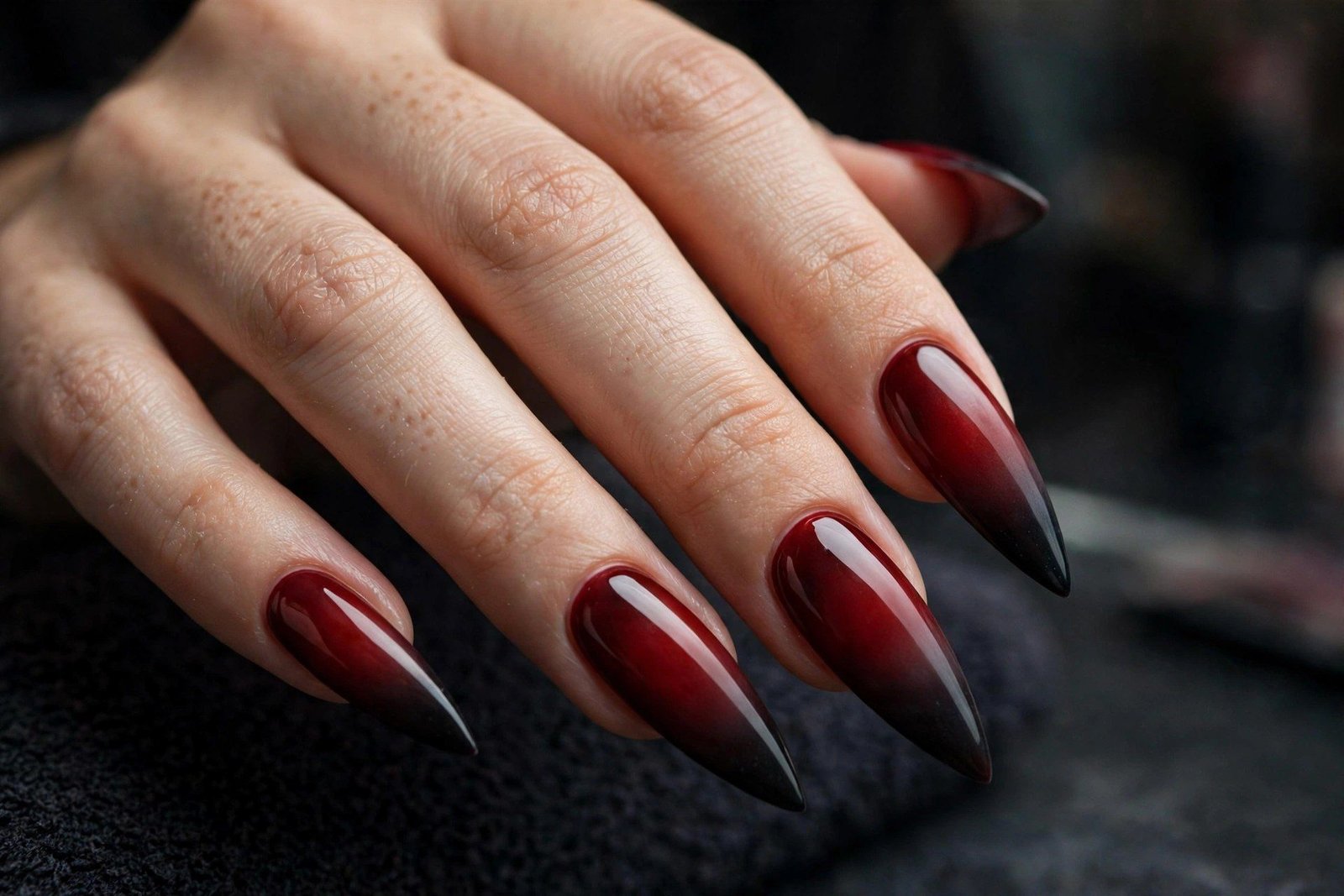 Blood moon ombre nails deep red to black