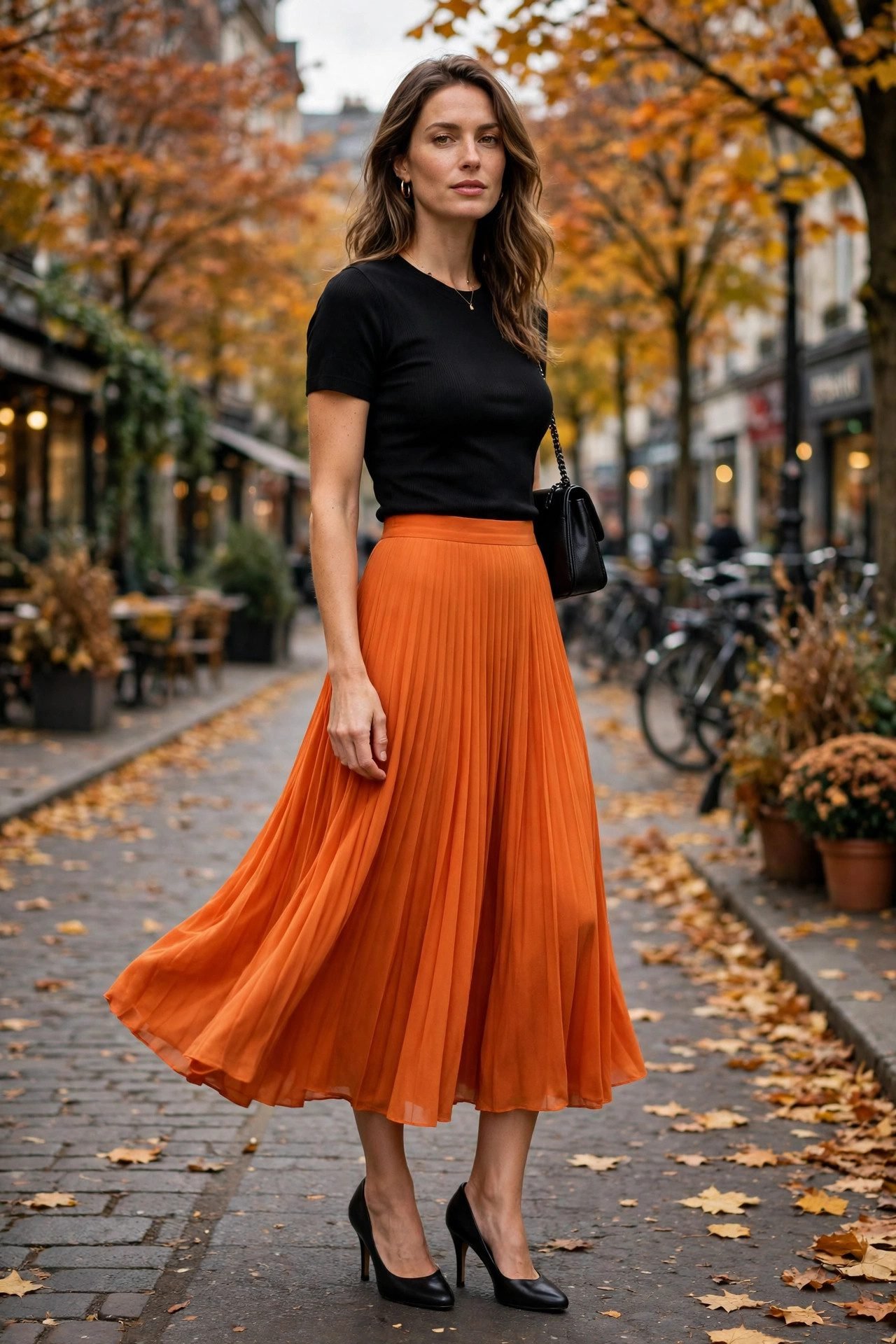 Orange midi skirt with black top October outfit