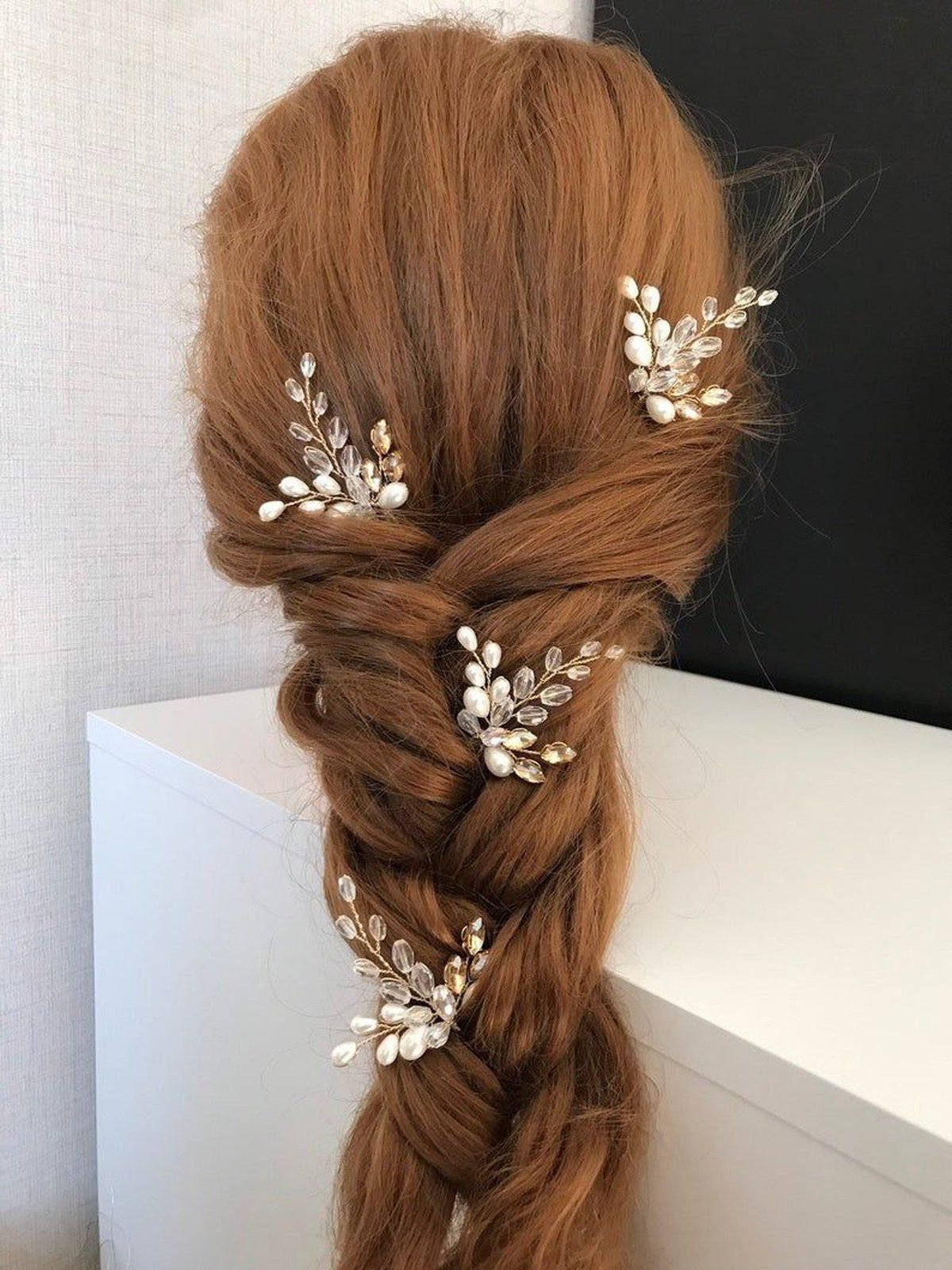Decorative hair pins in braids