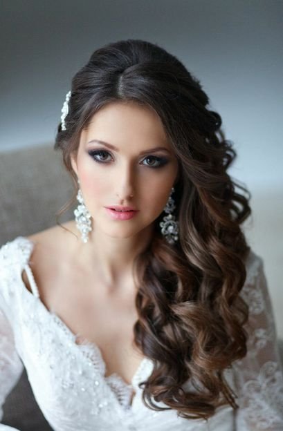 Side-swept curls homecoming hairstyle