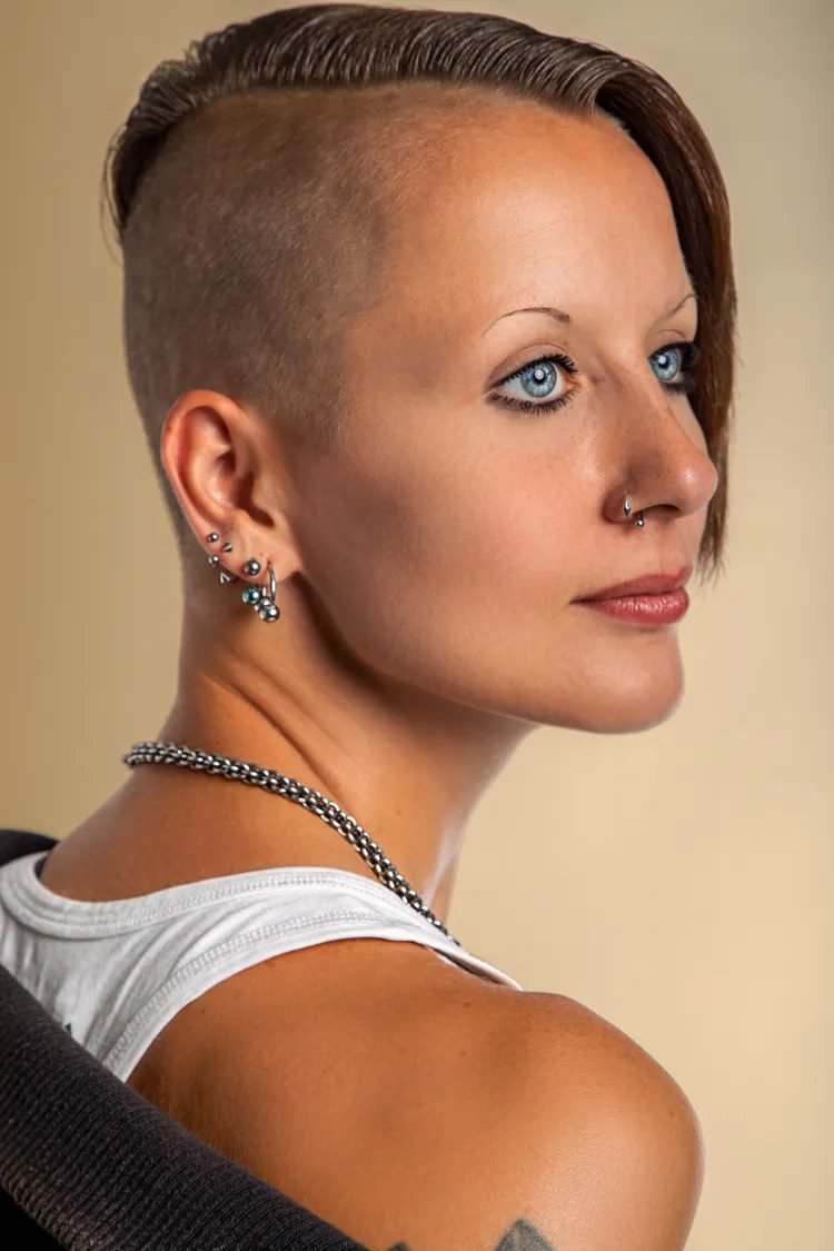 Slicked-back pixie haircut for a vampire costume