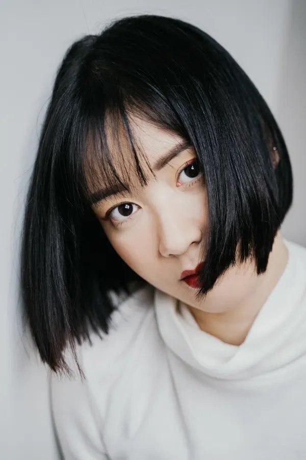 Blunt bob haircut on a woman, gothic style