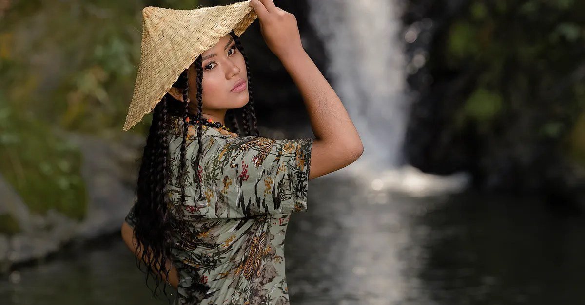 Woman in hawaiian shirt with camera, tourist style