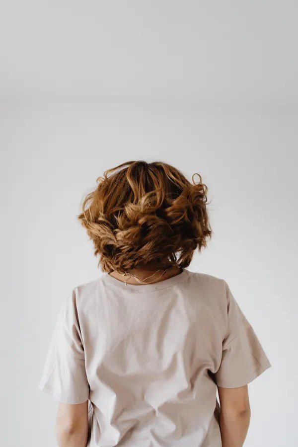 Curly bob haircut on a woman