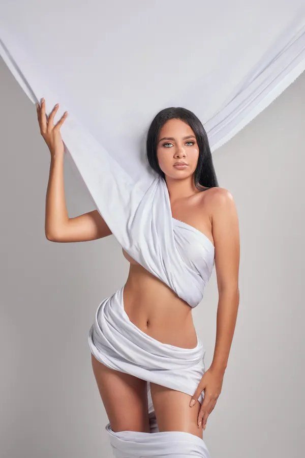 Woman in white outfit wrapped style