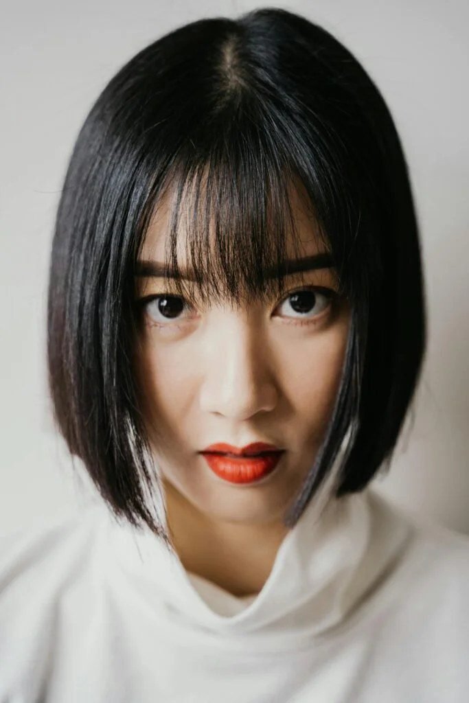 Center part sleek short hairstyle