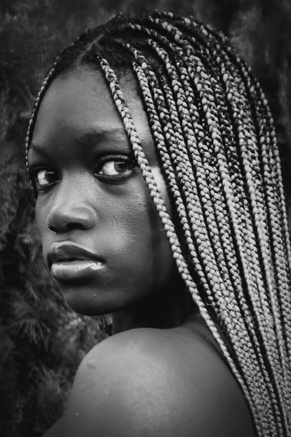 Woman with double dutch braids hairstyle