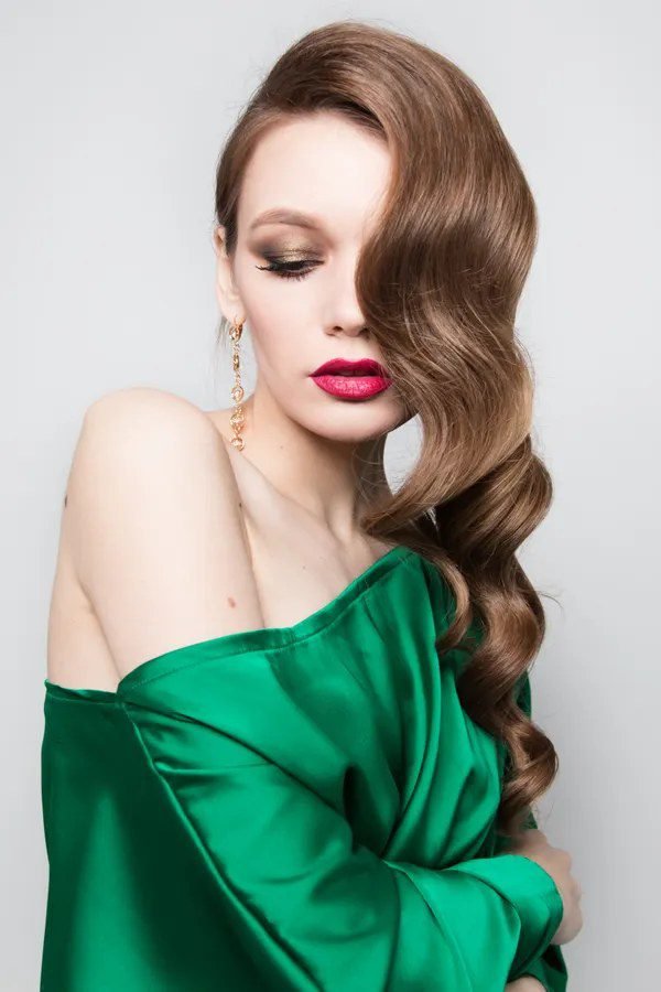 Elegant vintage updo on long hair for a haunted mansion costume