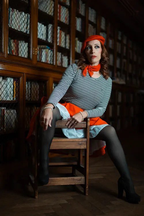 Woman in striped top with beret, french style